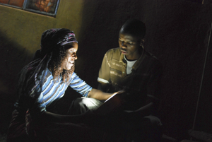 Experiencing solar lighting in the darkness of night Â© Lighting Africa