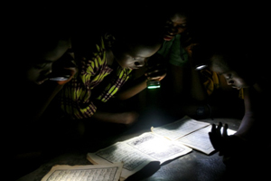 Using modern lights to read © Peter DiCampo