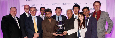 The winning team from the New York University, Abu Dhabi with some of the Judges Â© Global Hult Challenge 