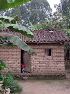 SHS charging on the roof of a house ©Lighting Africa/Ian Muir